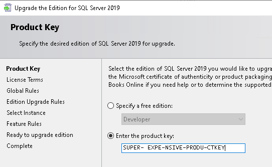 Screenshot showing SQL server edition upgrade wizard product key page with a license key entered